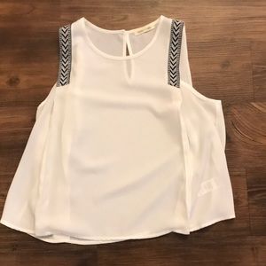 White top with black embroidery